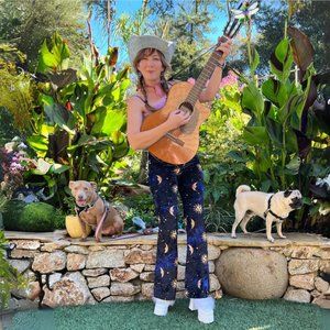 Adorable navy blue and gold crushed velvet flair pants and tie crop top